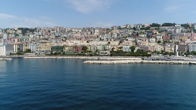 Aerial view flight towards Naples in Italian Napoli Chiaia Mergellina distric Naples is regional capital of Campania and the third-largest municipality in Italy after Rome and Milan 4k quality