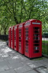 Obraz premium Typical red telephone booths in central London (United Kingdom)