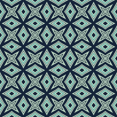 Green Geometric pattern in repeat. Fabric print. Seamless background, mosaic ornament, ethnic style. 