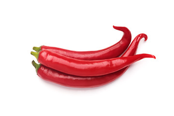 Three hot chili peppers isolated on white background