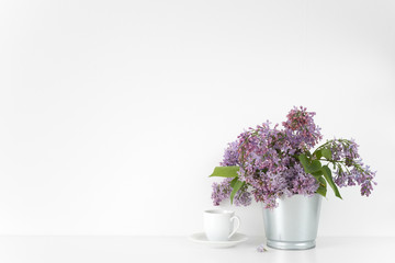 Composition with lilac bouquet on white background