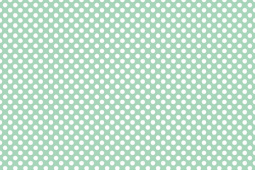 White and green polka dot background pattern
