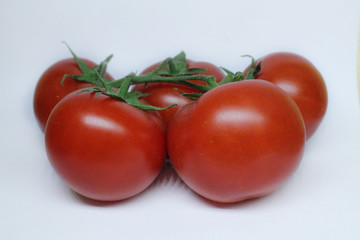 red tomatoes background. Group of tomatoes