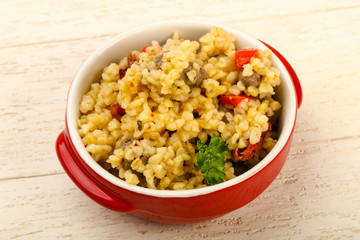 Bulgur with chicken hearts