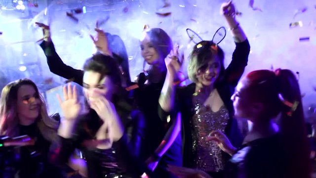 Backstage of Filming a Party. Real backstage of filming a night party. Actors are dancing in confetti