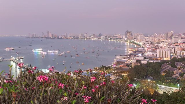 4K Day to Night Time lapse of the panorama view of Pattaya city in Thailand.
