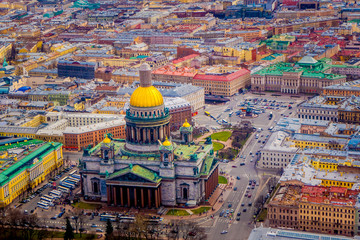 Beautiful aerial view landscape of Saint Isaac's Cathedral surrounding of buildings of the city of St. Petersburg durring a sunny day
