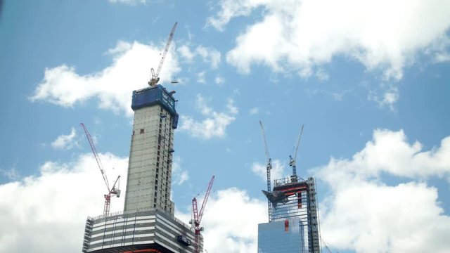 NEW YORK CITY - MAY 2018 - Cranes lift building materials during construction of a high rise tower in Manhattan.mov