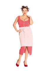 beautiful plus size housewife in red dress with curlers in hair isolated on white