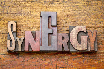 synergy - word abstract in wood type