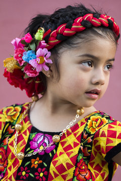 Girl wearing a traditional dress from Istmo de Tehuantepec.