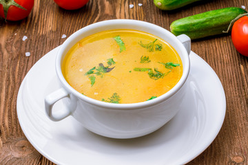 Chicken soup bouillon in a plate