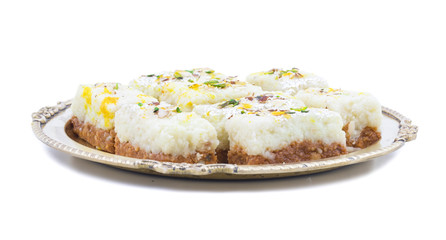 Indian Diwali Sweet Food Kalakand Also Know as Halwa or Mawa Kalakand is a Creamy Delicacy Made From Paneer or Cottage Cheese, The Dish Originated in Alwar, Rajasthan. Isolated on White Background