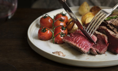 Close up of a cutting a fillet steak food photography recipe idea