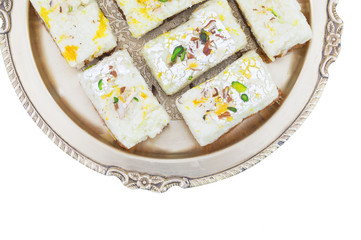 Indian Diwali Sweet Food Kalakand Also Know as Halwa or Mawa Kalakand is a Creamy Delicacy Made From Paneer or Cottage Cheese, The Dish Originated in Alwar, Rajasthan. Isolated on White Background