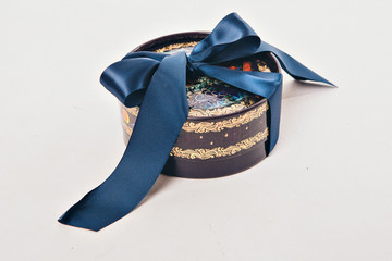 gift box with blue bow on white background