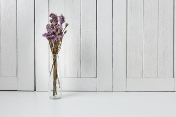 Dried flower on wooden table