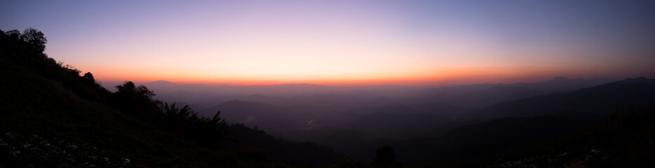 Fototapeta na wymiar Panorama view of Sunset on the mountain.