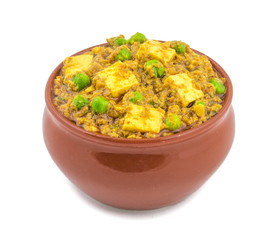 Indian Cuisine Mattar Paneer is a Vegetarian North Indian Dish Consisting of Peas And Paneer in a Tomato Based Sauce, Spiced with Garam Masala. It is often Served with Indian type of Tandoori Roti