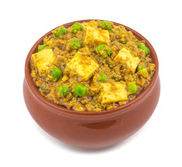 Indian Cuisine Mattar Paneer is a Vegetarian North Indian Dish Consisting of Peas And Paneer in a Tomato Based Sauce, Spiced with Garam Masala. It is often Served with Indian type of Tandoori Roti