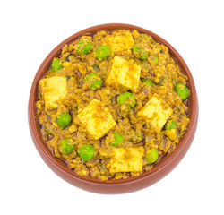 Indian Cuisine Mattar Paneer is a Vegetarian North Indian Dish Consisting of Peas And Paneer in a Tomato Based Sauce, Spiced with Garam Masala. It is often Served with Indian type of Tandoori Roti