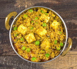 Indian Cuisine Mattar Paneer is a Vegetarian North Indian Dish Consisting of Peas And Paneer in a Tomato Based Sauce, Spiced with Garam Masala. It is often Served with Indian type of Tandoori Roti