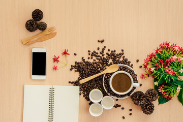 Cup of coffee and cake on the table with copy space background.