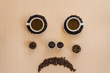 People face make from coffee beans.