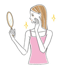 鏡を見る女性 嬉しい