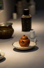 red enameled pottery teapot