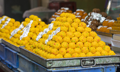 Group of Indian Sweet Bundi Laddu also know as laddoo, ladoo, laddo are ball-shaped sweets popular in the Indian festivals