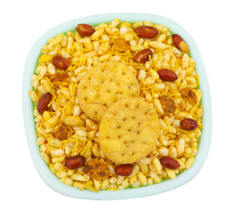 Indian Street Spicy Food Bhel puri is a savoury snack, and is also a type of chaat. It is made of puffed rice, vegetables and a tangy tamarind sauce. isolated on white background