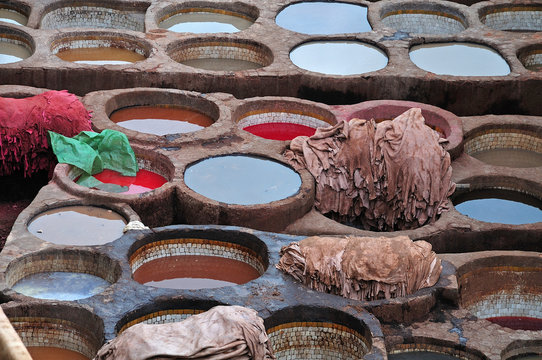 wells filled with dyes in tannery in Fez, Morocco