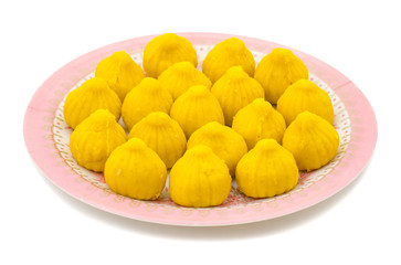 Indian Sweet Food Modak Also Know as Laddu, Khoya, khova Modak, Kozhakkatta, Modhaka, Kadubu, Modhakam, Kozhakkattai, Kudumu. Made up of Coconut And Jaggery, Rice Flour, Wheat with Khava