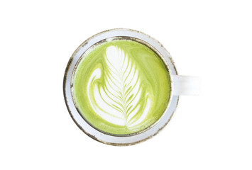Isolated Matcha green tea latte in a cup on white background with clipping path.Hot Matcha coffee latte with beautiful milk foam latte art texture.