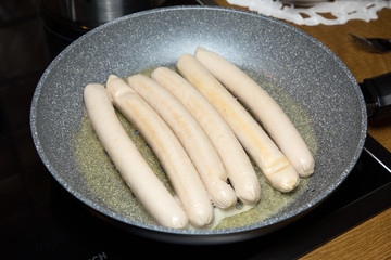 sausauges in a pan
