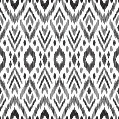 Tribal pattern. Seamless background. Scribble texture. Black and white graphic design. Creative vector illustration. Ethnic boho ornament. Impressive fashion print.