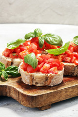 fresh tomato bruschetta. italian food appetizer with basil