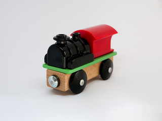 A toy train, a place for text, close-up, isolated