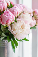 Beautiful bouquet of pink peonies . Floral composition, scene, daylight. Wallpaper. Vertical photo