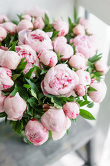 Beautiful bouquet of pink peonies . Floral composition, scene, daylight. Wallpaper. Vertical photo