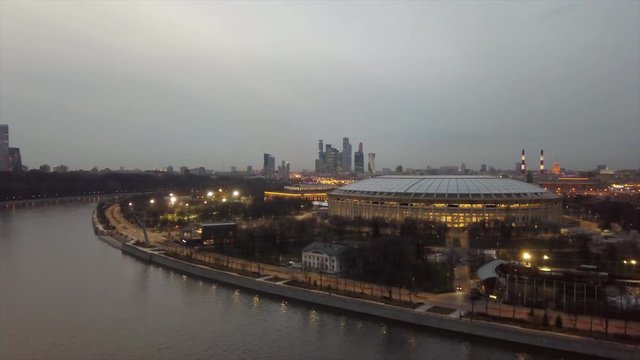 twilight illuminated moscow city famous luzhniki stadium complex aerial panorama 4k russia
