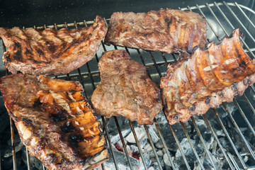 barbecue with ribs and steak