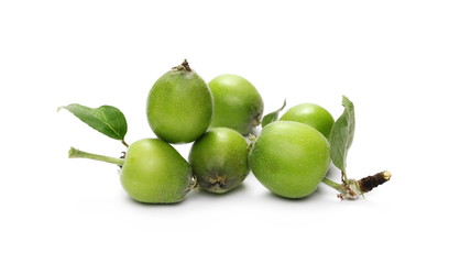 Organic small, green apples with leaves and twig isolated on white background