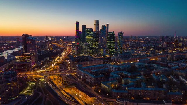sunset sky night illuminated moscow city traffic street aerial cityscape panorama 4k timelapse russia

