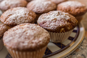 Batch of homemade freshly baked cupcakes or muffins