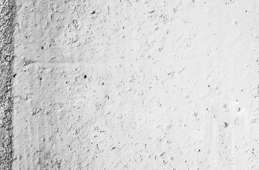 White ribbed texture background. Light grey old painted whitewash wall with scratches and stains.