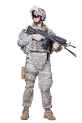 Full length portrait of equipped US army soldier in camouflage uniform, helmet and body armor...