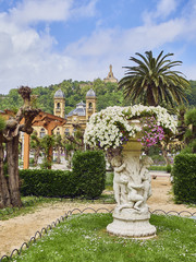 Alderdi-Eder gardens and City hall building of San Sebastian in background at sunny day. Donostia, Basque Country, Guipuzcoa.