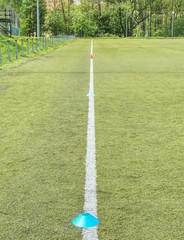 Football (soccer) sport field. Pattern of green artificial turf. Outdoor training play field